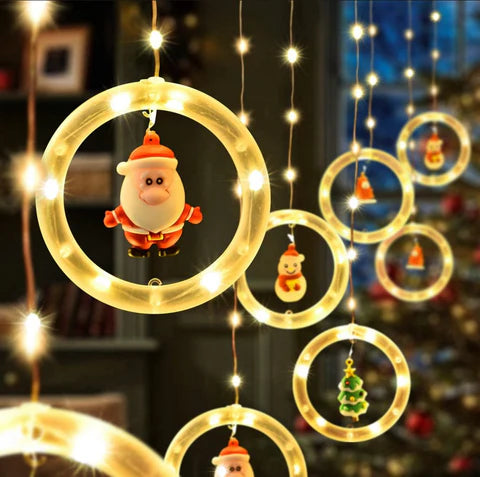 Cortina de luces con figuras Navideñas