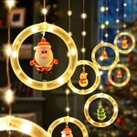 Cortina de luces con figuras Navideñas